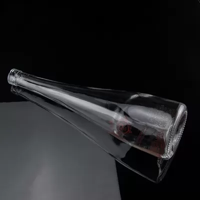 Conical screen-printed vodka and whisky glass bottle, 750 ml, containing super flint glass