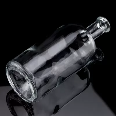 Acid-etched surface glass material for 750-milliliter capacity spirits glass bottles