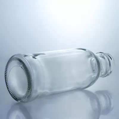 The material of the cup body is glass. It is a glass juice coffee bottle with a screw cap and a transparent milk bottle with a capacity of 250ml or 500ml