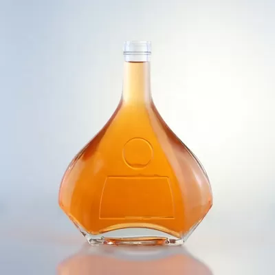 Champagne-colored 1-liter glass bottle with custom options of decal screen printing and cork seal